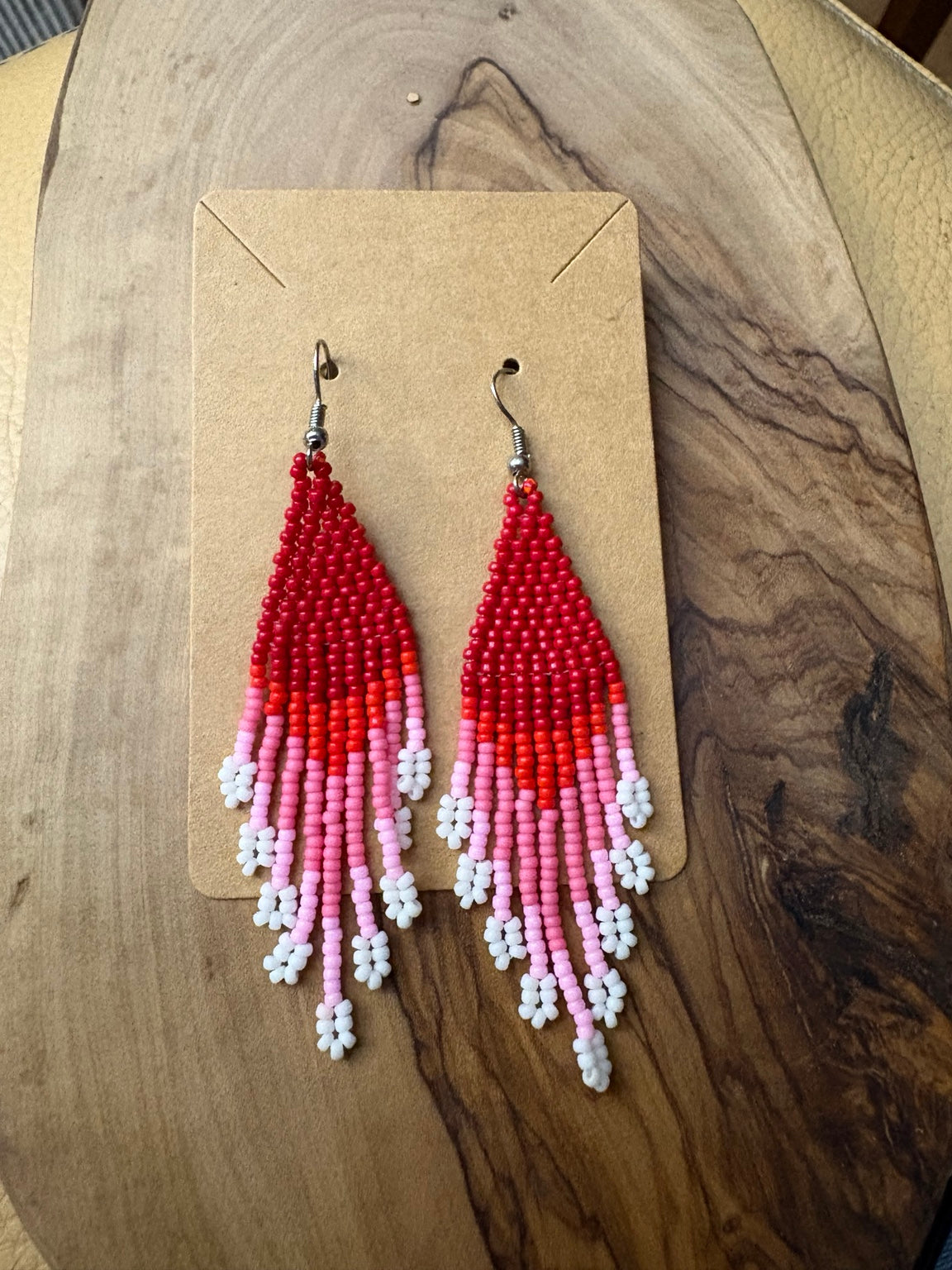 Red and pink handmade boho seed bead fringe earrings with white floral tips
